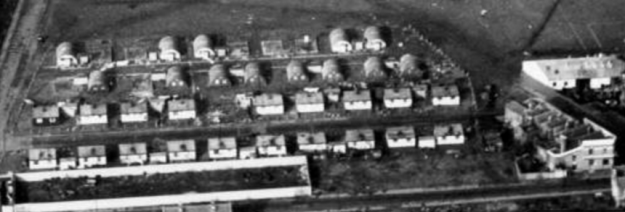 1954 aerial view of Queens Road and its temporary housing - this clip is from Merton Memories photo 49269 and is copyright London Borough of Merton.