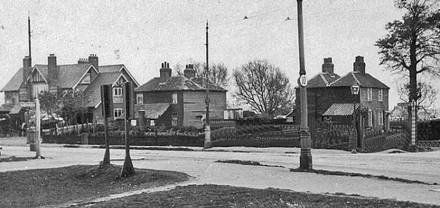 From a Percy Mayhew postcard. The Ravensbury Arms is on the left.