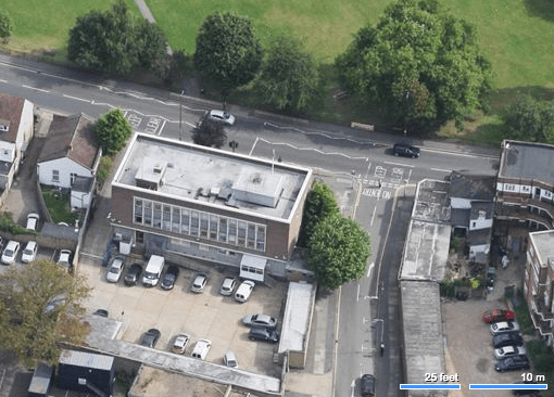 Aerial view showing rear of building. The road on the right is Mitcham Park.