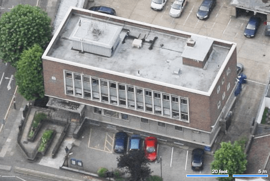 Aerial view showing front of building.